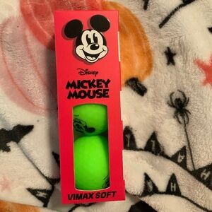 Bright green Mickey golf balls